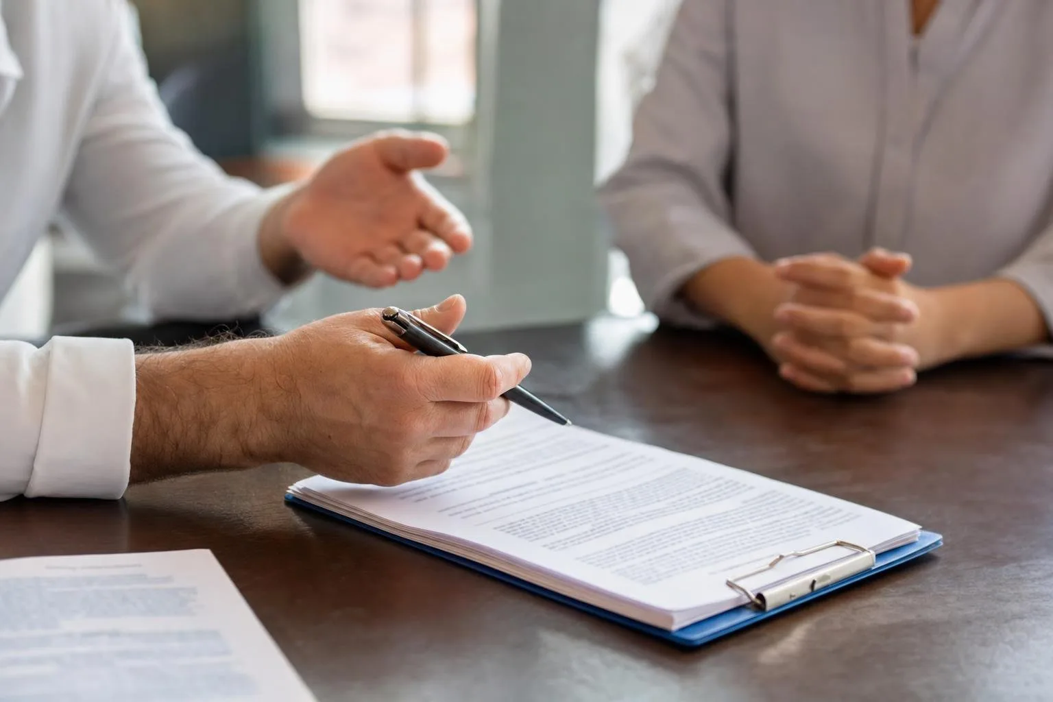 attorney reviewing medical bills and damage records to value a Virginia injury claim